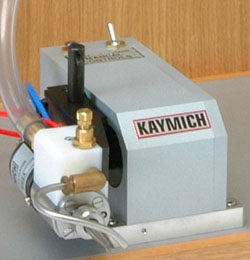Side seam applicator on automatic retracting stand